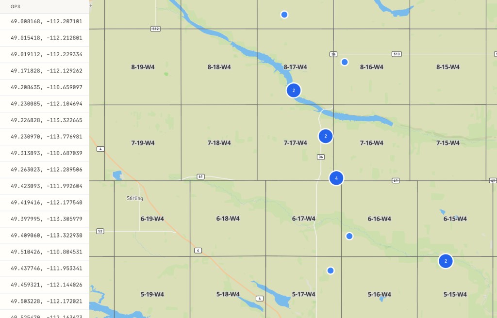 Batch-converted hail claim pins clustered along a storm path in central Alberta, with DLS grid labels and GPS coordinates in the sidebar
