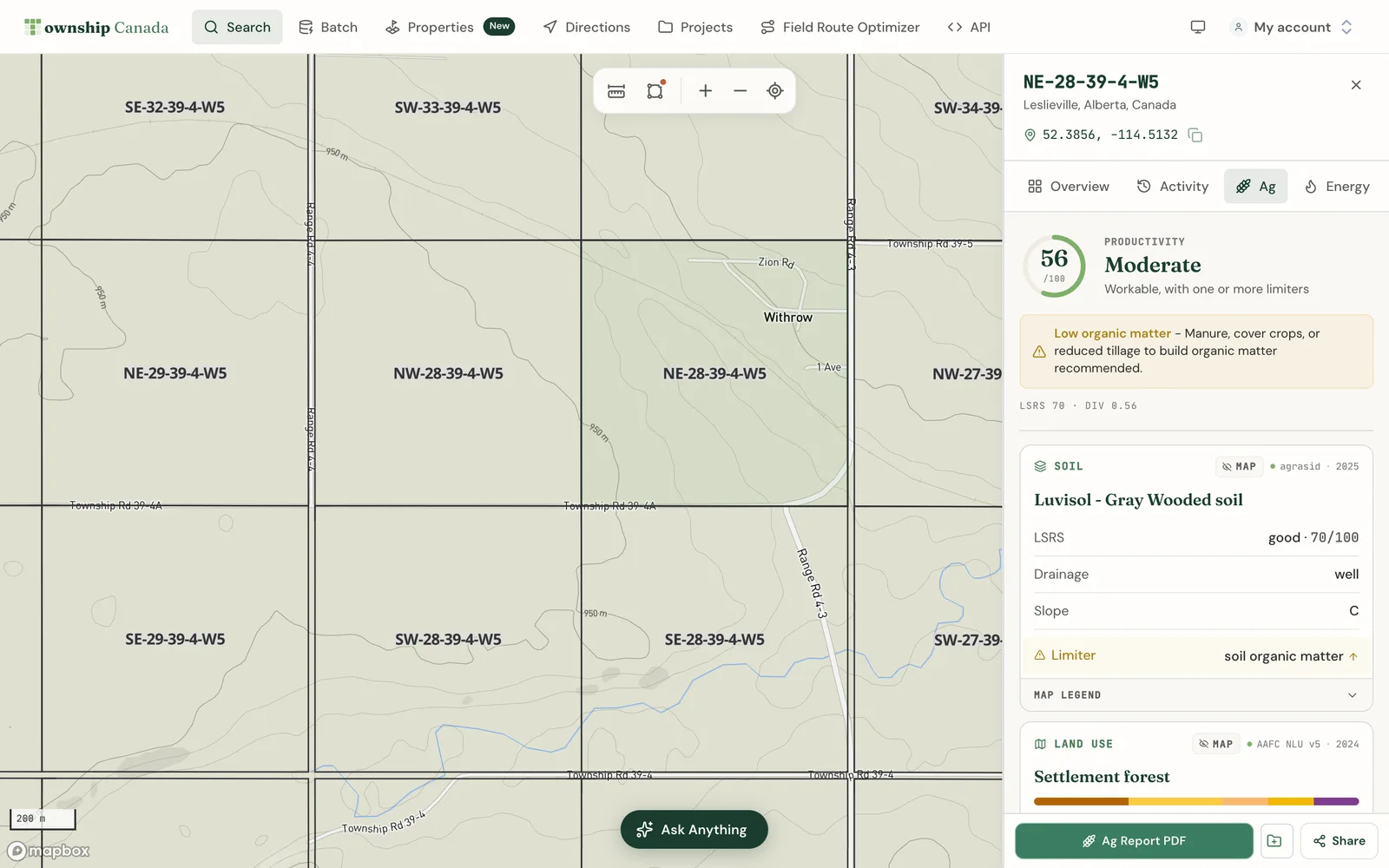 The Ag tab of a parcel report for NE-28-39-4-W5 near Leslieville, Alberta, showing a Productivity Score of 56, a low organic matter limiter, Luvisol soil with an LSRS rating of 70, and the start of the land use card
