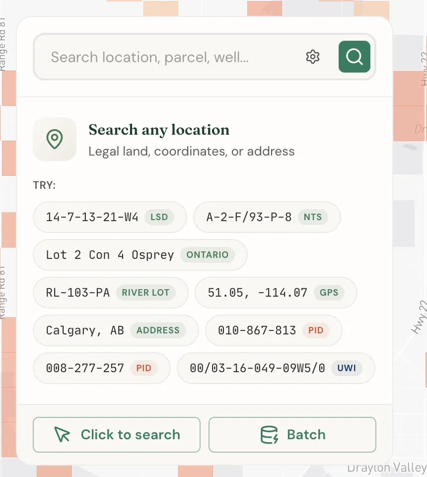 The Township Canada search panel with example inputs for LSD, NTS, Ontario lot and concession, river lot, GPS, address, PID, and UWI formats