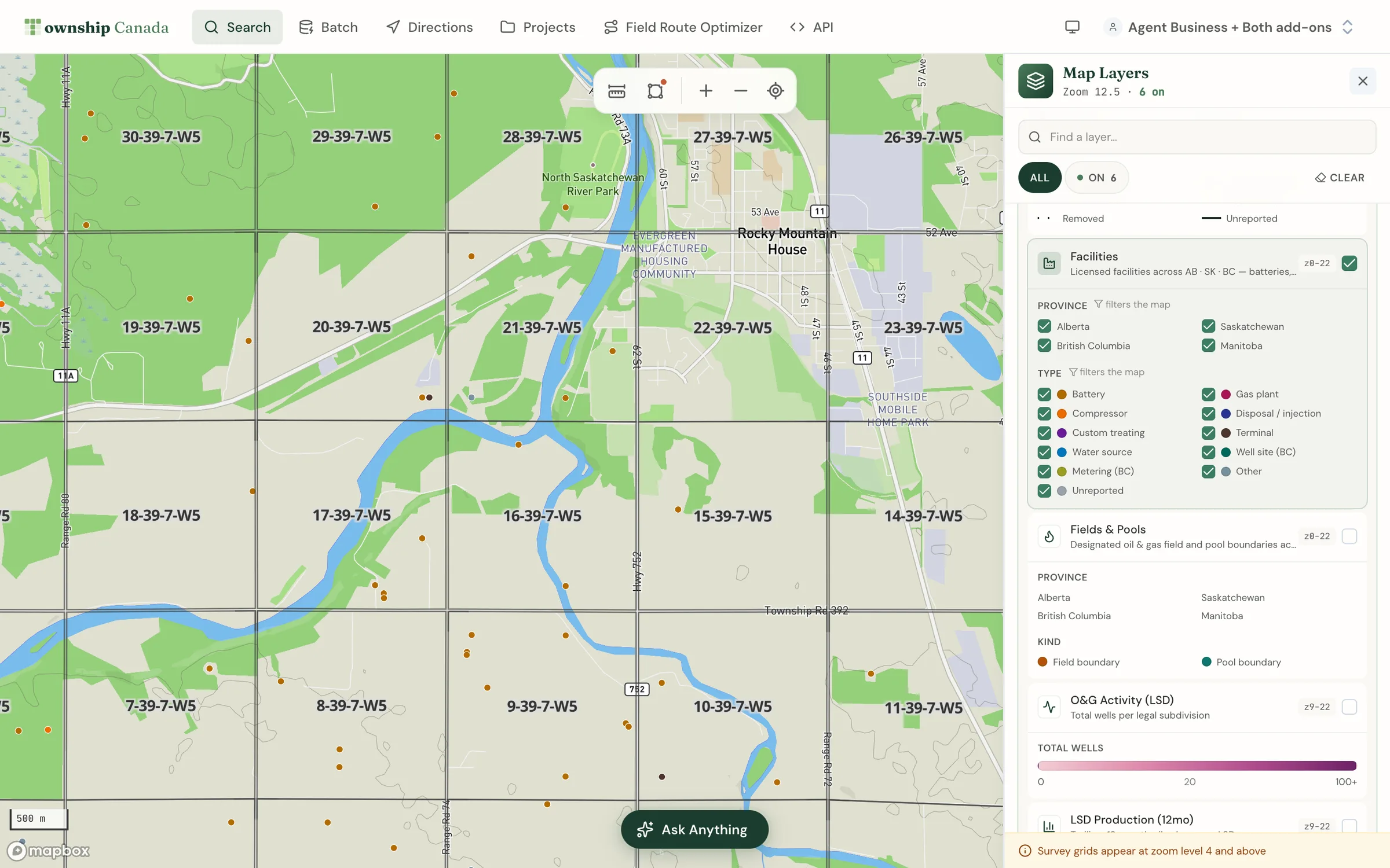 The Facilities layer near Rocky Mountain House, Alberta, with facilities coloured by category and the category legend in the Layers panel